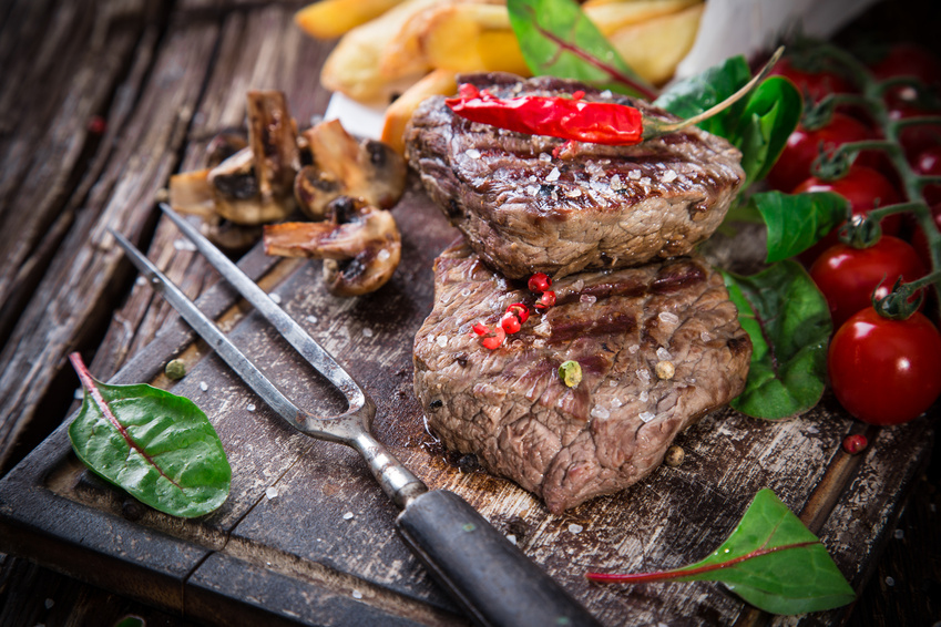 Steaks auf einem Teller - Link zu Gasthäusern